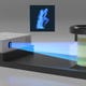 Se proyecta una imagen bidimensional sobre una resina fotosensible colocada sobre un bote rotatorio. La luz hace que la resina se solidifique y se forme el objeto que queramos.
Imagen: Lawrence Livermore National Laboratory